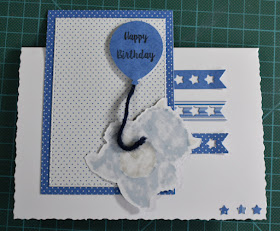 Attach the bottom of the balloons string to the back of your monster image