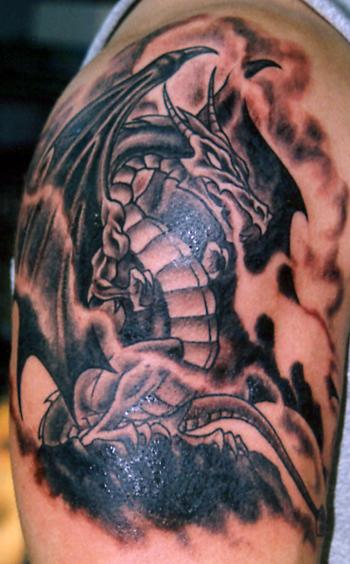 Dragon Tattoo Arm Art tribal dragon tattoo that's designed like architect