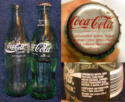 Coca-Cola Classic 8 oz. bottle from 1986 shown to left of original Coke 6-1/2 oz. bottle circa 1977. The original Coke ingredients (upper right) included only sugar and not the cheaper high fructose corn syrup and/or sucrose.