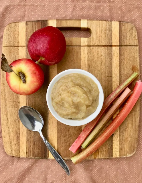 Rhubarb, apples, and a bowl of finished rhubarb applesauce.