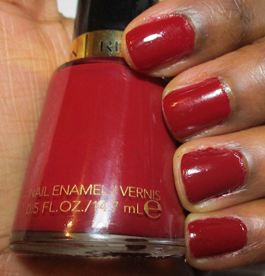 swatch of Revlon's 'Raven Red' nail polish on Dark Skin