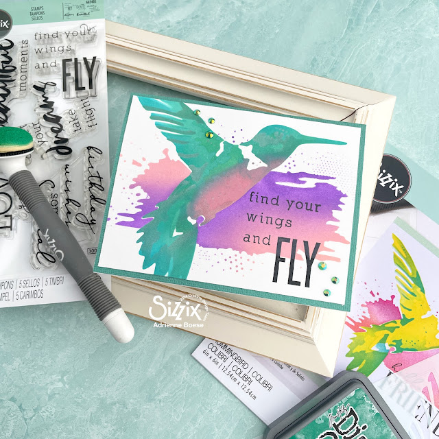 Stenciled and pop-up hummingbird card created with the Sizzix Hummingbird Stencil, Tim Holtz Distress Oxides, and the Spellbinders Pop-Up Hummingbird die.