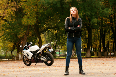 A Fashionable Girl Wearing Leather Jacket and Boots