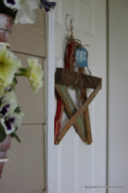 salvaged star, beyond the picket fence, summer decor, http://bec4-beyondthepicketfence.blogspot.com/2013/06/salvaged-star-door-decor.html