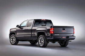 Rear 3/4 view of 2014 GMC Sierra