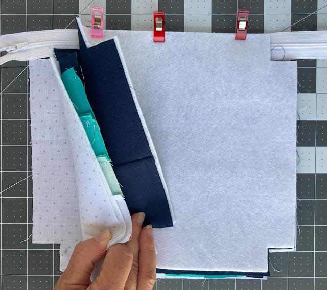Install the zipper - Zipper Pouch Tutorial with Boxed corners - easy to sew zipper pouch