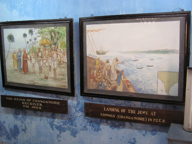 Photos on diplay inside the old Jewish synagogue in Cochin - showing arrival in Kerala