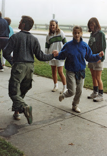 A group of people dancing.