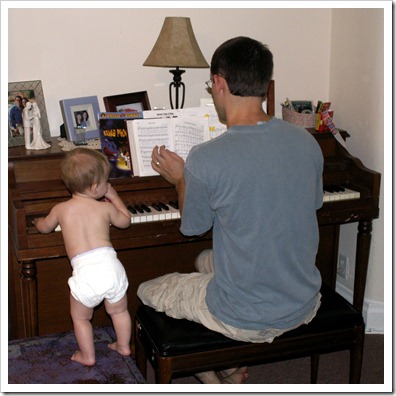 Elaine 10 months playing piano with Daddy