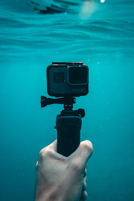 picture of a go pro doing photography underwater