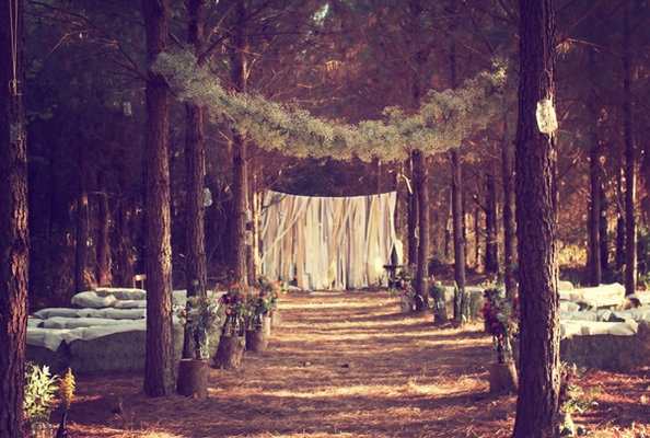 I love that the seating in this wedding is totally within the forest ie 