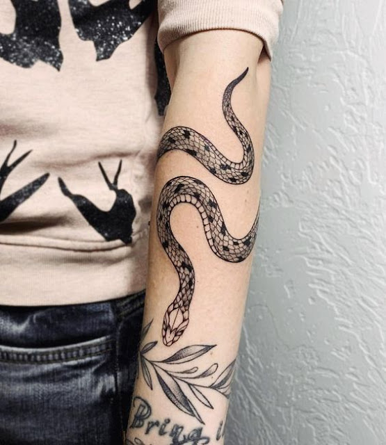 snake-all-over-arm-tattoo