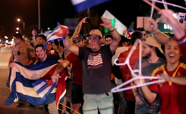 Image Attribute: People celebrate after the announcement of the death of Cuban revolutionary leader Fidel Castro, in the Little Havana district of Miami, Florida, U.S. November 26, 2016. REUTERS/Javier Galeano