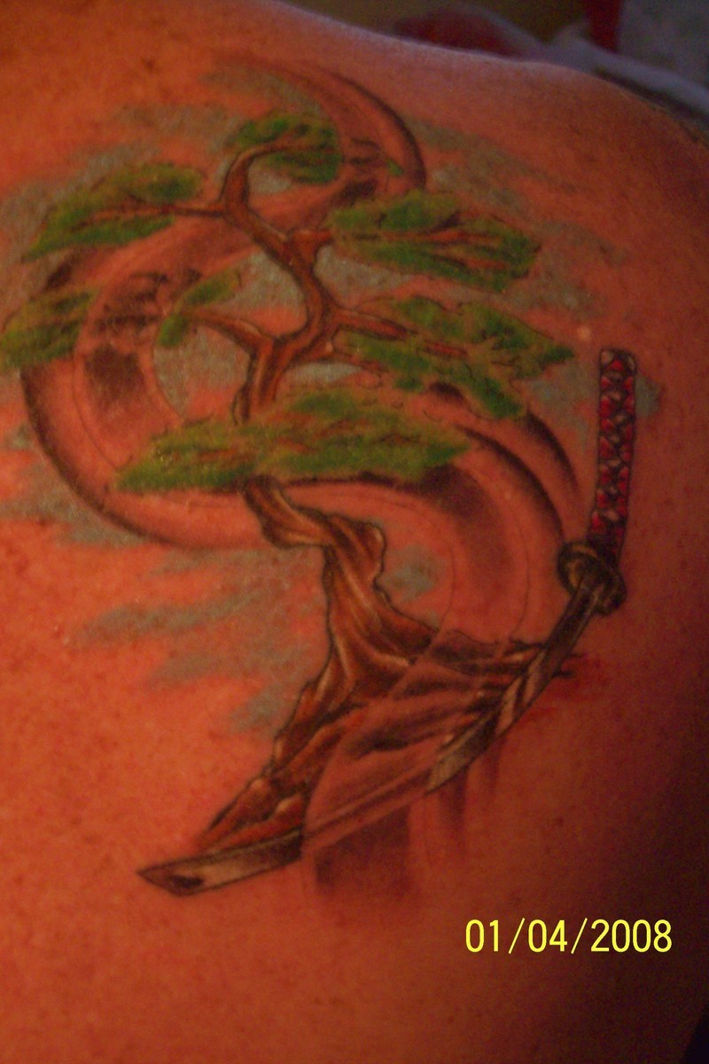 Katana tattoo and tree.