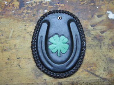 Paperweight or Plaque, wet molded/shaped leather with a four leaf clover 