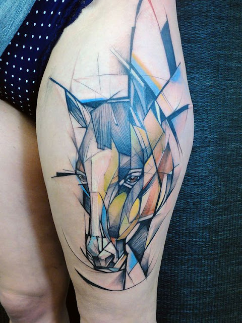 abstract-horse-tattoo-colouful-on-thigh