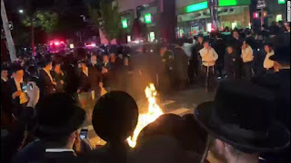 Protester Harold 'Heshy' Tischler taken into custody for inciting a riot during Orthodox Jewish protests against New York's Covid-19 restrictions