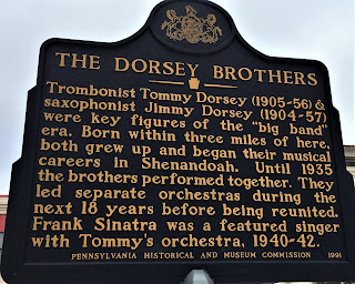 The Dorsey Brothers. Trombonist Tommy Dorsey (1905-56) & saxophonist Jimmy Dorsey (1904-57) were key figures of the "big band" era. Born within three miles of here, both grew up and began their musical careers in Shenandoah. Until 1935 the brothers performed together. They led separate orchestras during the next 18 years before being reunited. Frank Sinatra was a featured singer with Tommy''s orchestra, 1940-42.