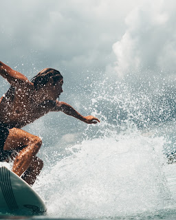 Surf the waves at Mandalika's well-known Gerupuk Beach, a haven for surfers