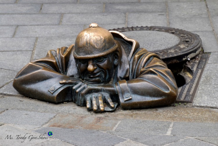 "Cumil, Man At Work" is one of several quirky statues in Bratislava | Ms. Toody Goo Shoes #bratislava #slovakia #danuberivercruise