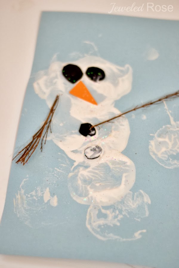 Snowman potato printing- a fun Winter craft for kids