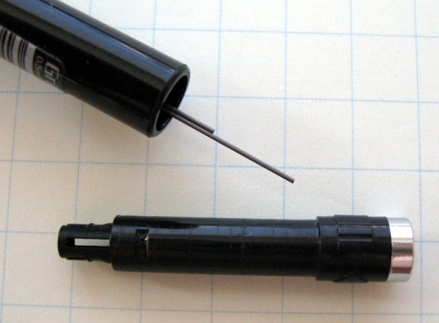 Eraser cartridge access to lead refills