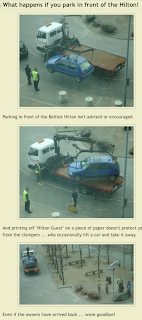 Car being clamped and towed away in front of the Belfast Hilton hotel in April 2008