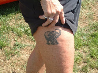 elephant tattoo on foot men