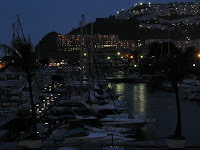 Lights reflected in the water of the marina