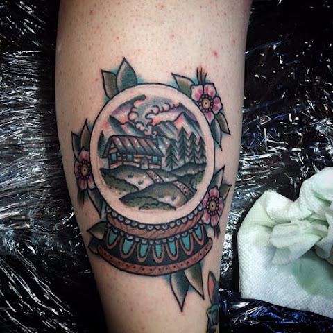 Keep Your Memories Encased In These Glinting Snow Globe Tattoos