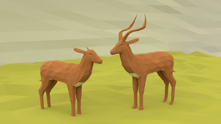 Impalas on grassy terrain