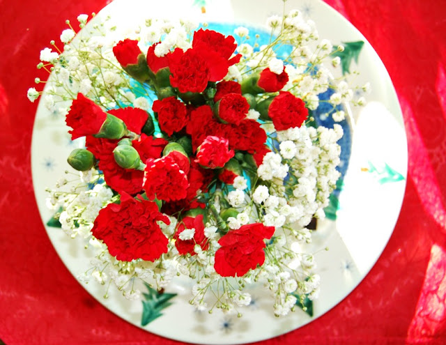 baby's breath, red carnations, red tablecloth, floral bouquet, athomewithjemma