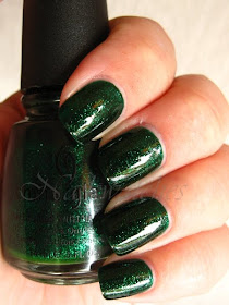 China Glaze Emerald Sparkle china glaze emerald sparkle green glitter jelly base nail polish permanent collection nailswatches