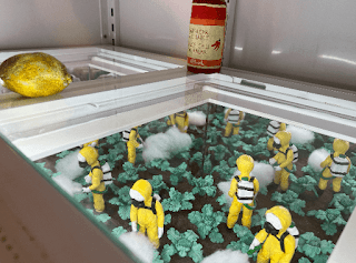 Biochem clay figures disinfecting fruit in a fridge