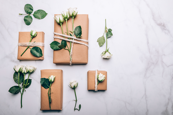 Use recycled Kraft paper for gift wrapping and wedding ceremony and reception decor for a sustainable eco-friendly wedding ceremony and reception