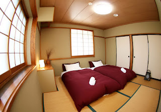 traditional japanese bedroom with red blanket