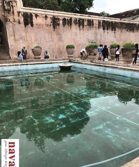 Ancient swimming pool with water in Water Palace, Indonesia.