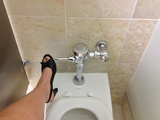 Using your foot to flush the toilet
