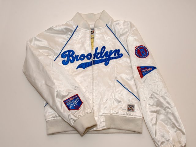 Detailed with Dodgers and Brooklyn emblems and patches, this jacket made me 