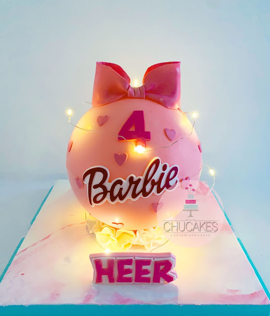 barbie pinata cake chucakes singapore ribbon fairy light lights