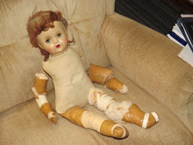 broken doll