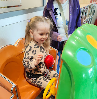 Joyful on the machines at the shops