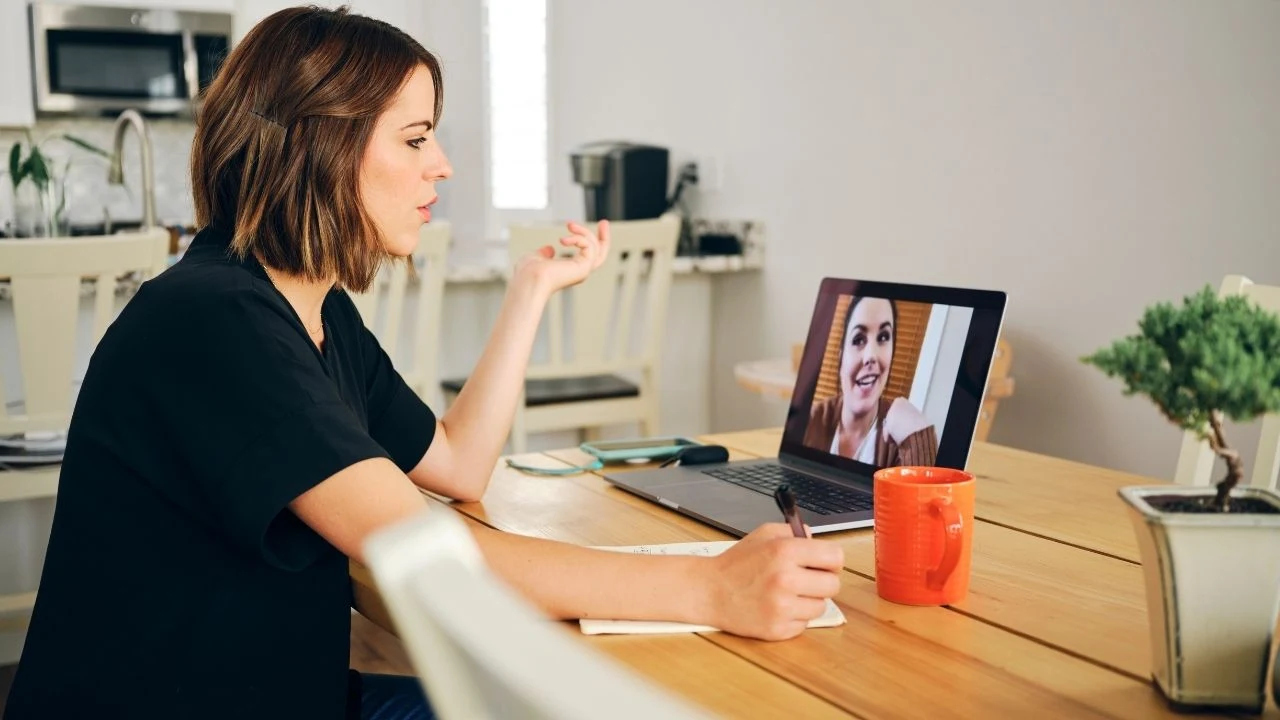 Young woman balancing work and family life.