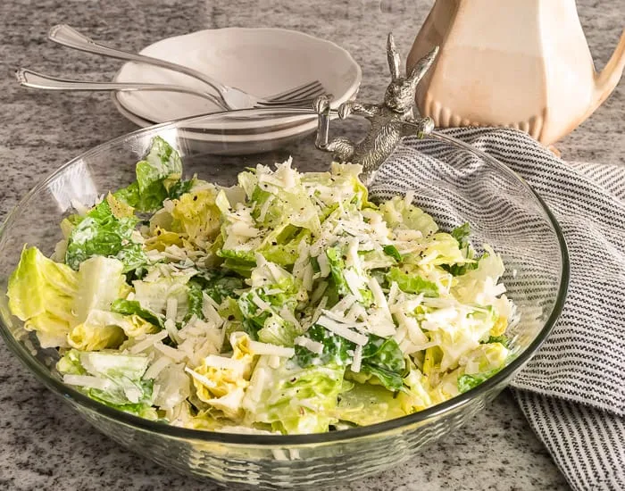 Caesar with grated parmesan and ground pepper, climbing bunny salad bowl