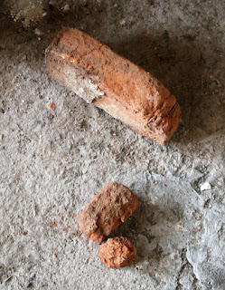 Two bricks from inside the chimney