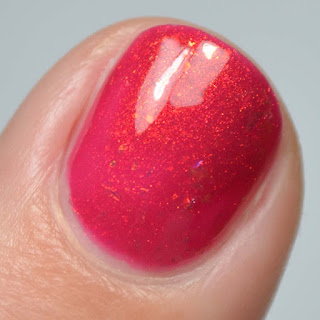 beet red nail polish macro