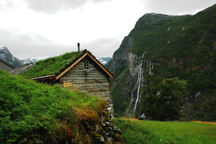 The Geirangerfjorden is a fjord in the Sunnmøre region of Møre og Romsdal county, Norway. It located entirely in Stranda Municipality. It is a 15-kilometre (9.3 mi) long branch off of the Sunnylvsfjorden, which is a branch off of the Storfjorden (Great Fjord). The small village of Geiranger is located at the end of the fjord where the Geirangelva river empties into it.