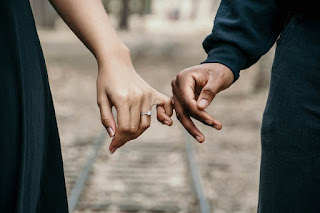 https://www.pexels.com/photo/man-in-black-long-sleeved-shirt-and-woman-in-black-dress-888899/