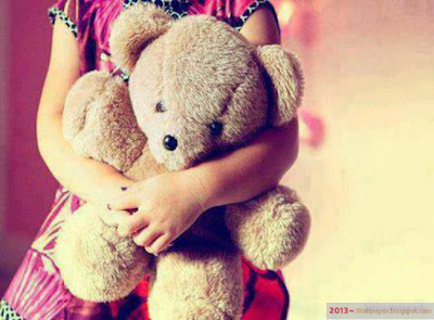 Beautiful-fashionable-girl-with-her-bear