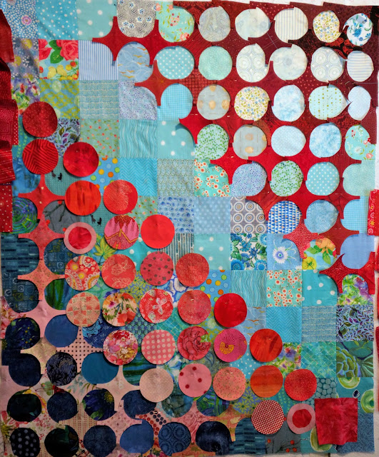 Pink and red fabric hugs and kisses on Circular Anomaly quilts. Double Vision quilts.